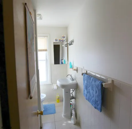 a bathroom with a sink and mirror