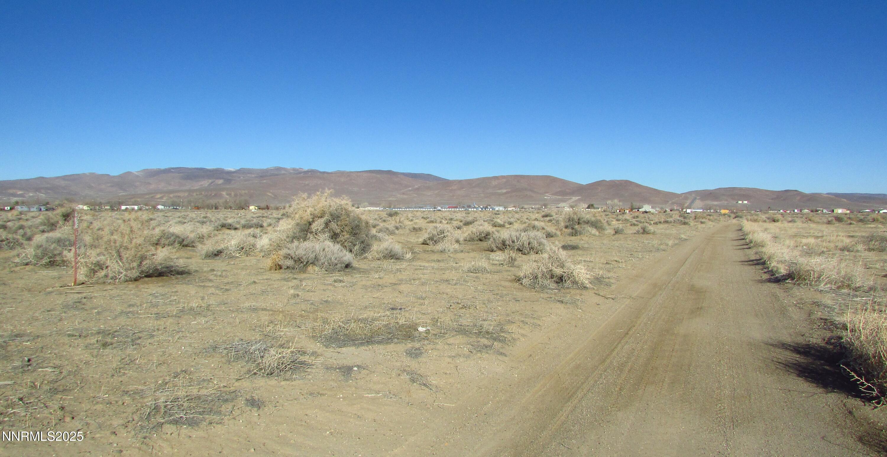 3810 Ft Churchill Street Silver Springs, NV 89429 - Photo 3 of 14 a view of mountain with lake view