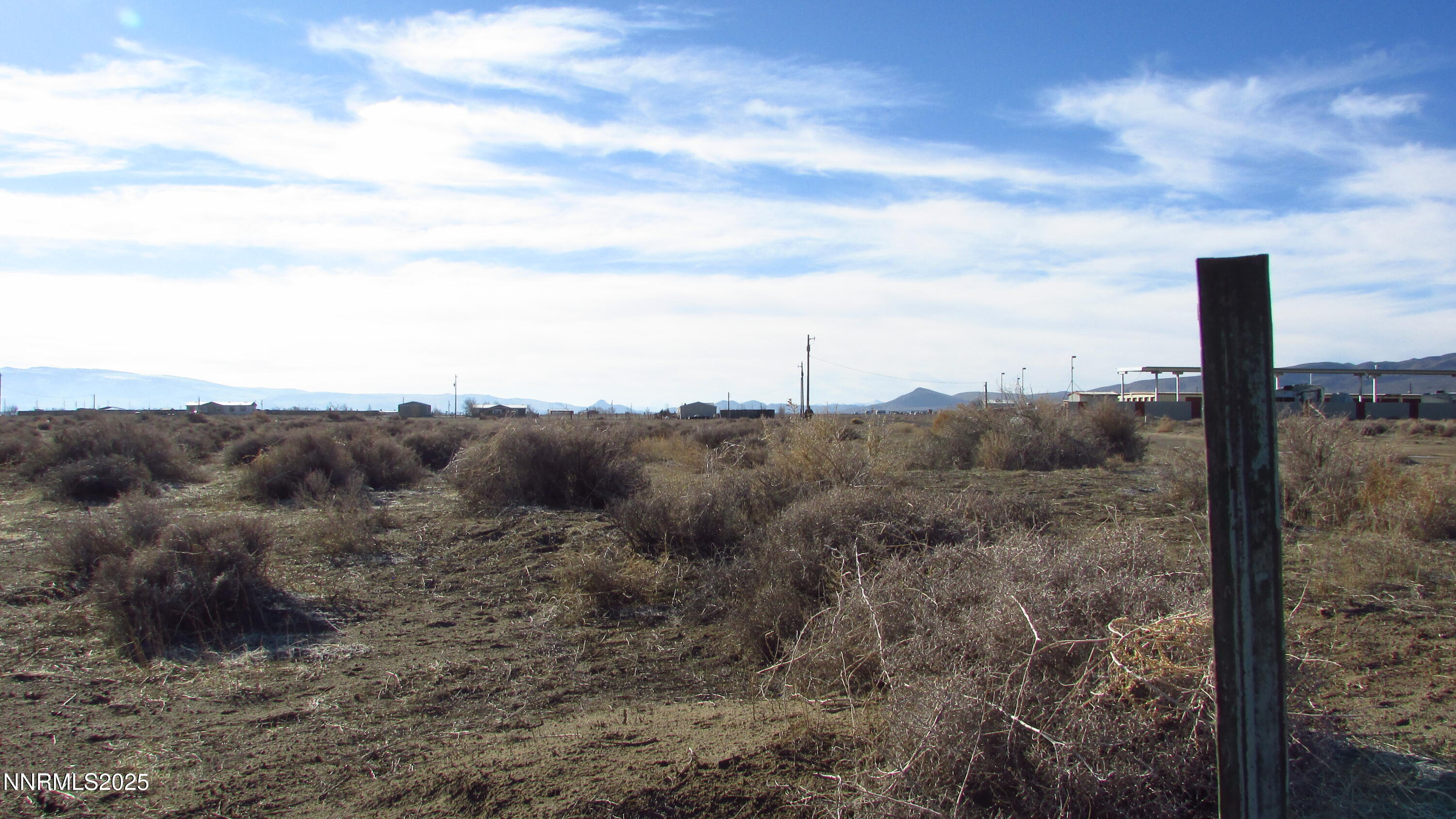 3810 Ft Churchill Street Silver Springs, NV 89429 - Photo 4 of 14 a view of a dry yard with green space