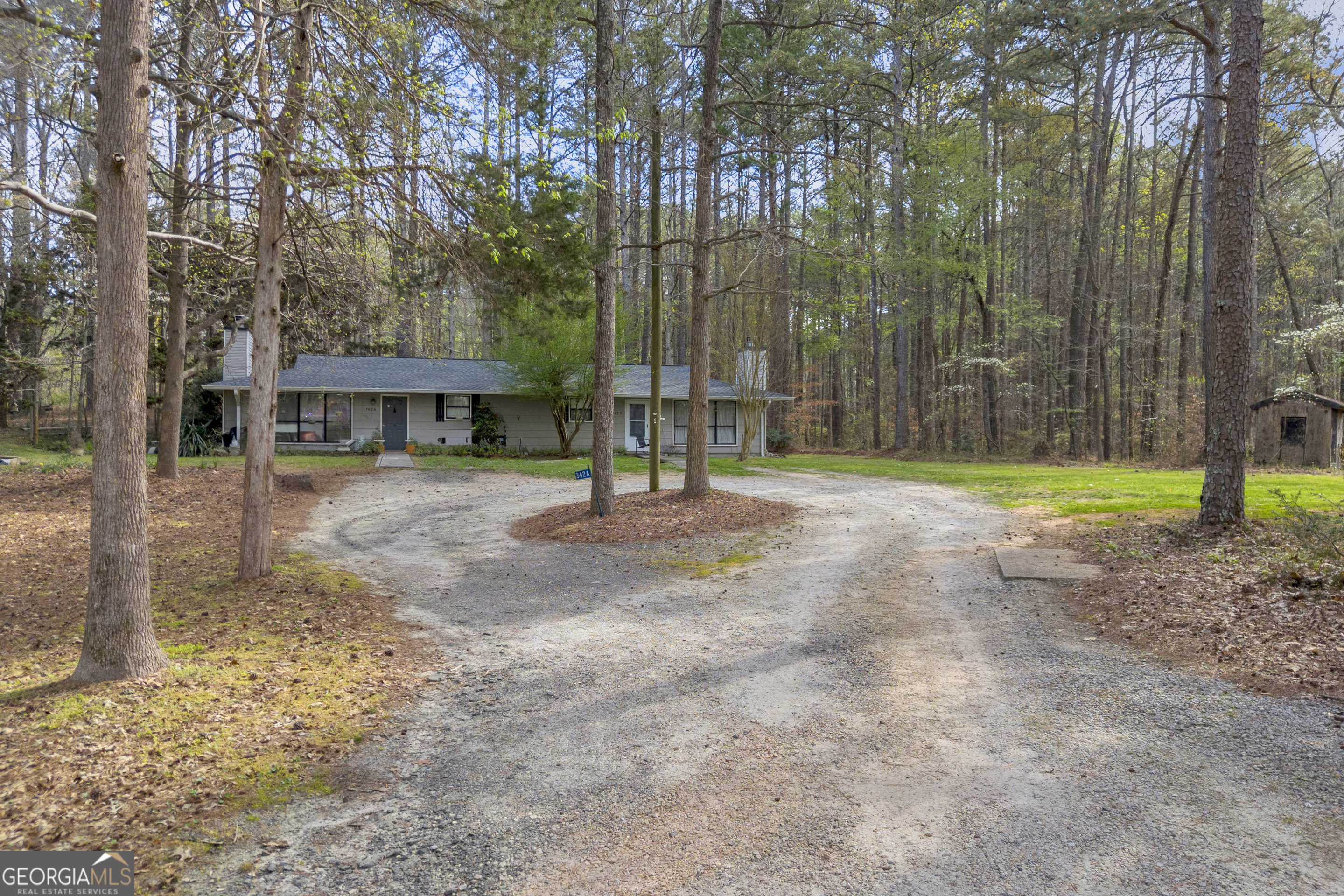 342 Brown Bridge Road Auburn, GA 30011 - Photo 15 of 74 a view of a park with swings and slides