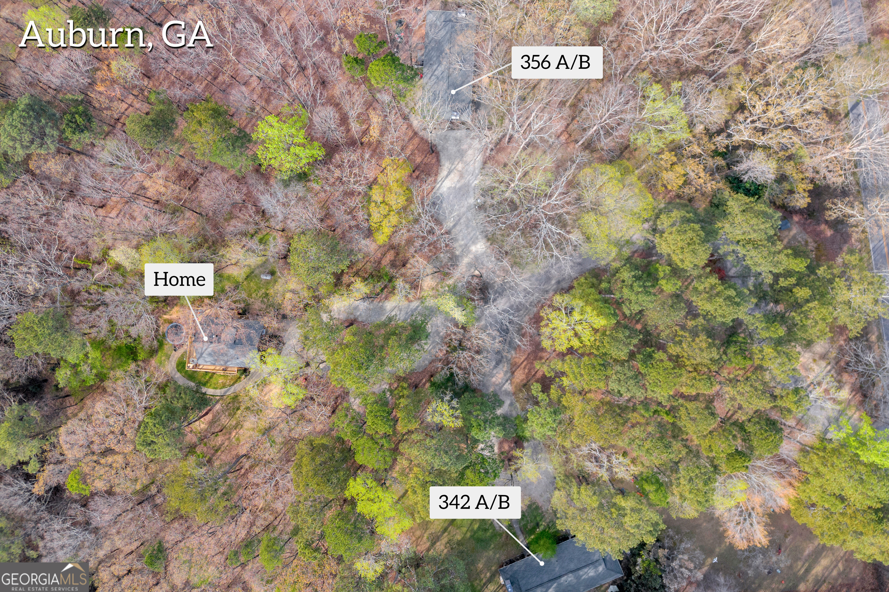 342 Brown Bridge Road Auburn, GA 30011 - Photo 2 of 74 a sign that is sitting on a brick wall