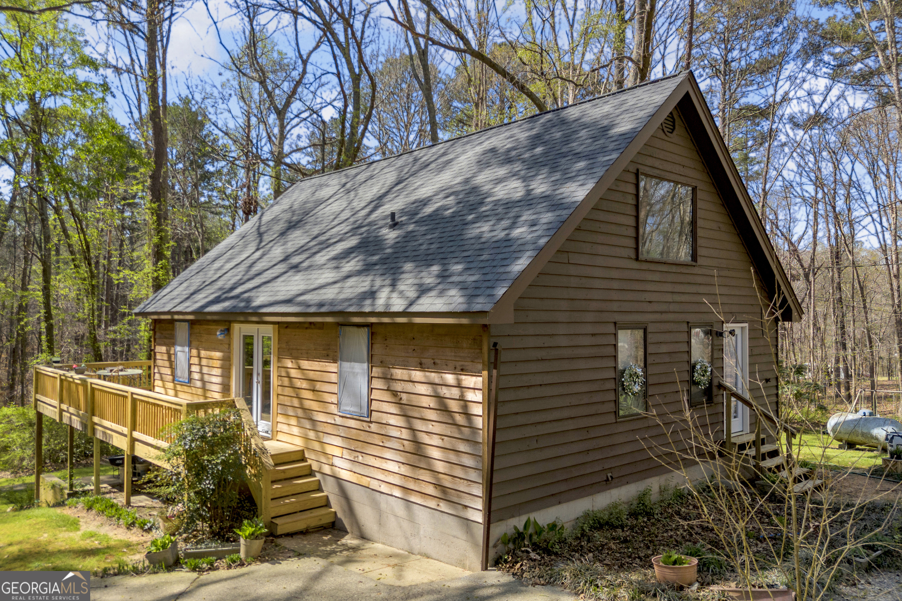 342 Brown Bridge Road Auburn, GA 30011 - Photo 33 of 74 a front view of a house with a yard