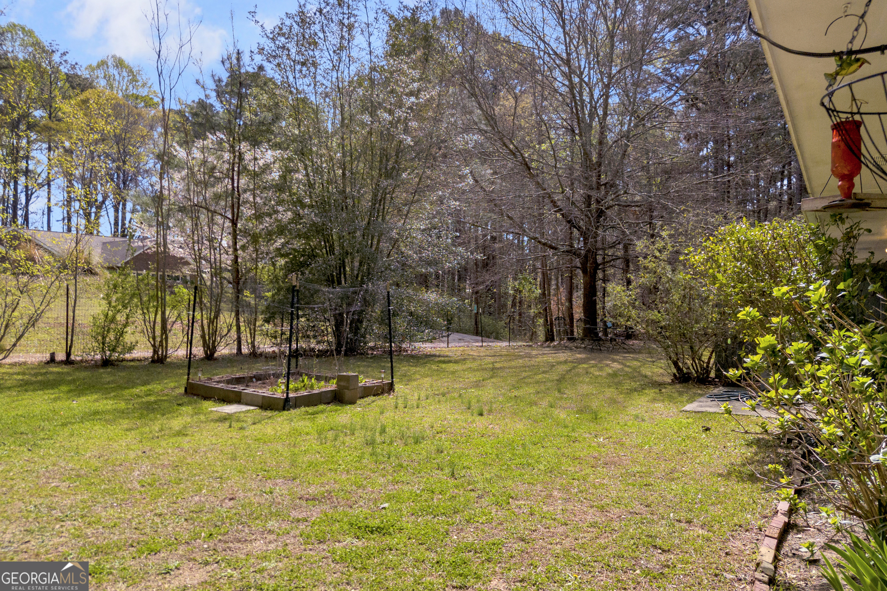 342 Brown Bridge Road Auburn, GA 30011 - Photo 42 of 74 a view of a swimming pool with an outdoor space and seating area