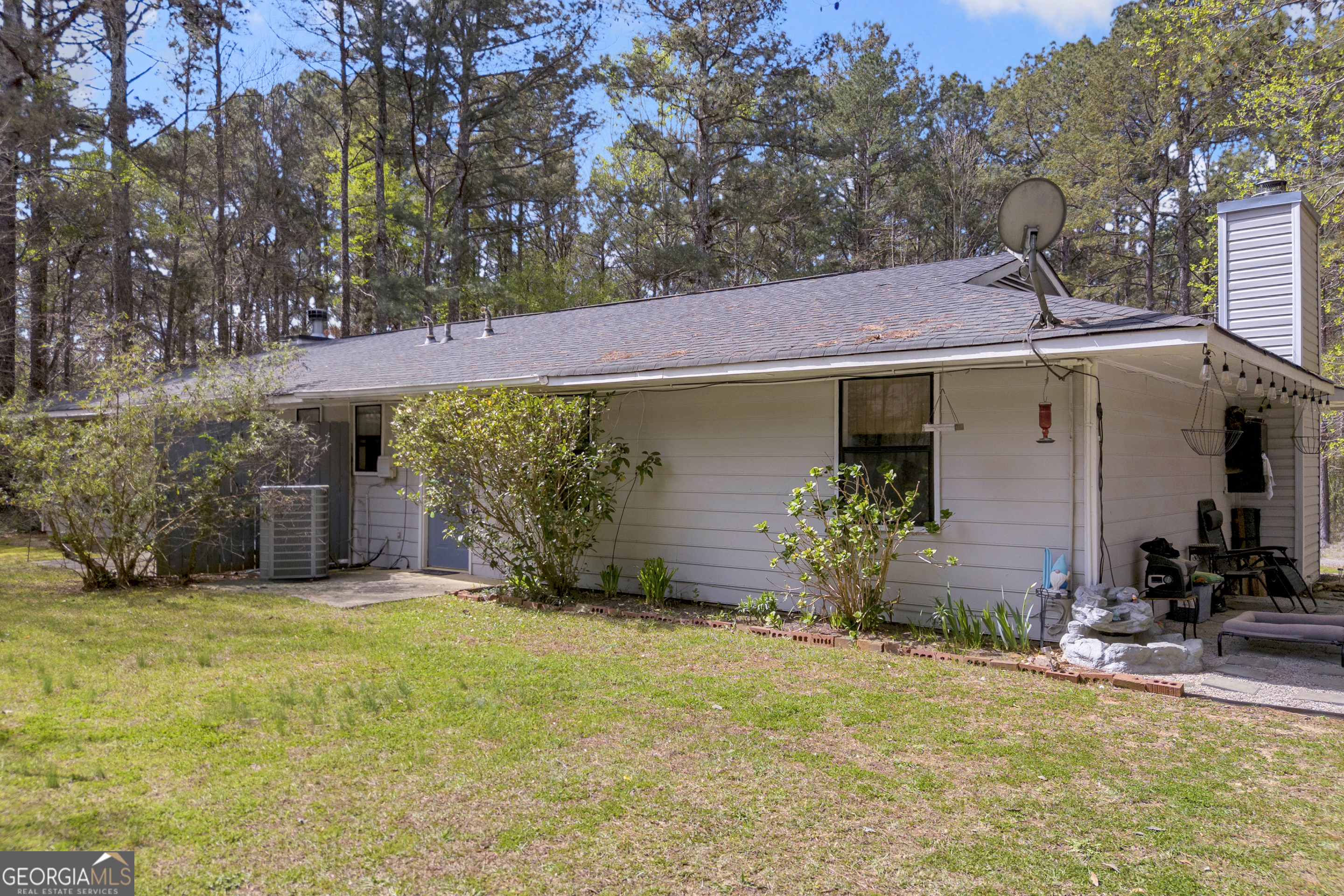 342 Brown Bridge Road Auburn, GA 30011 - Photo 44 of 74 a view of a house with back yard
