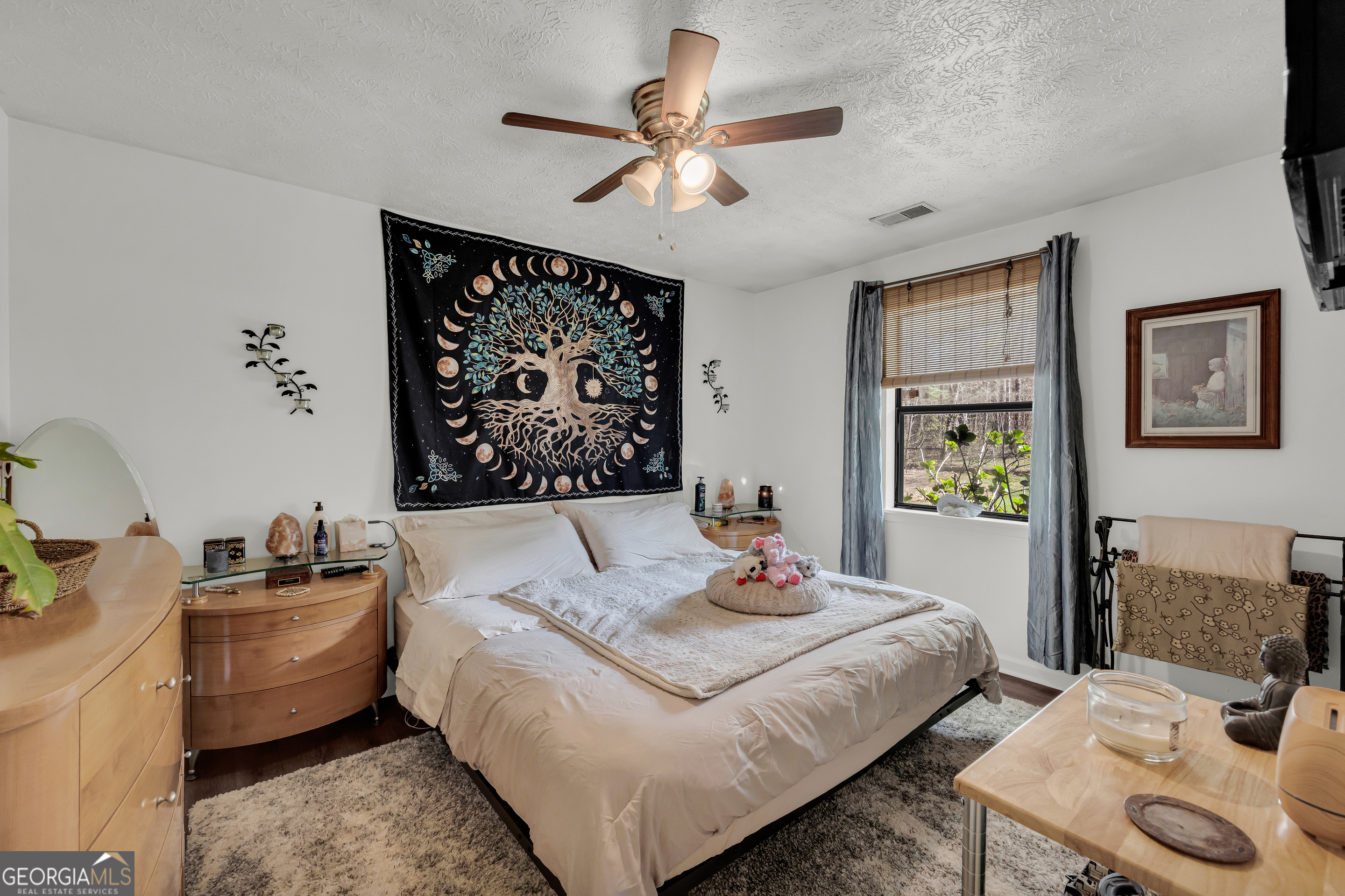 342 Brown Bridge Road Auburn, GA 30011 - Photo 69 of 74 a bedroom with a bed and dresser