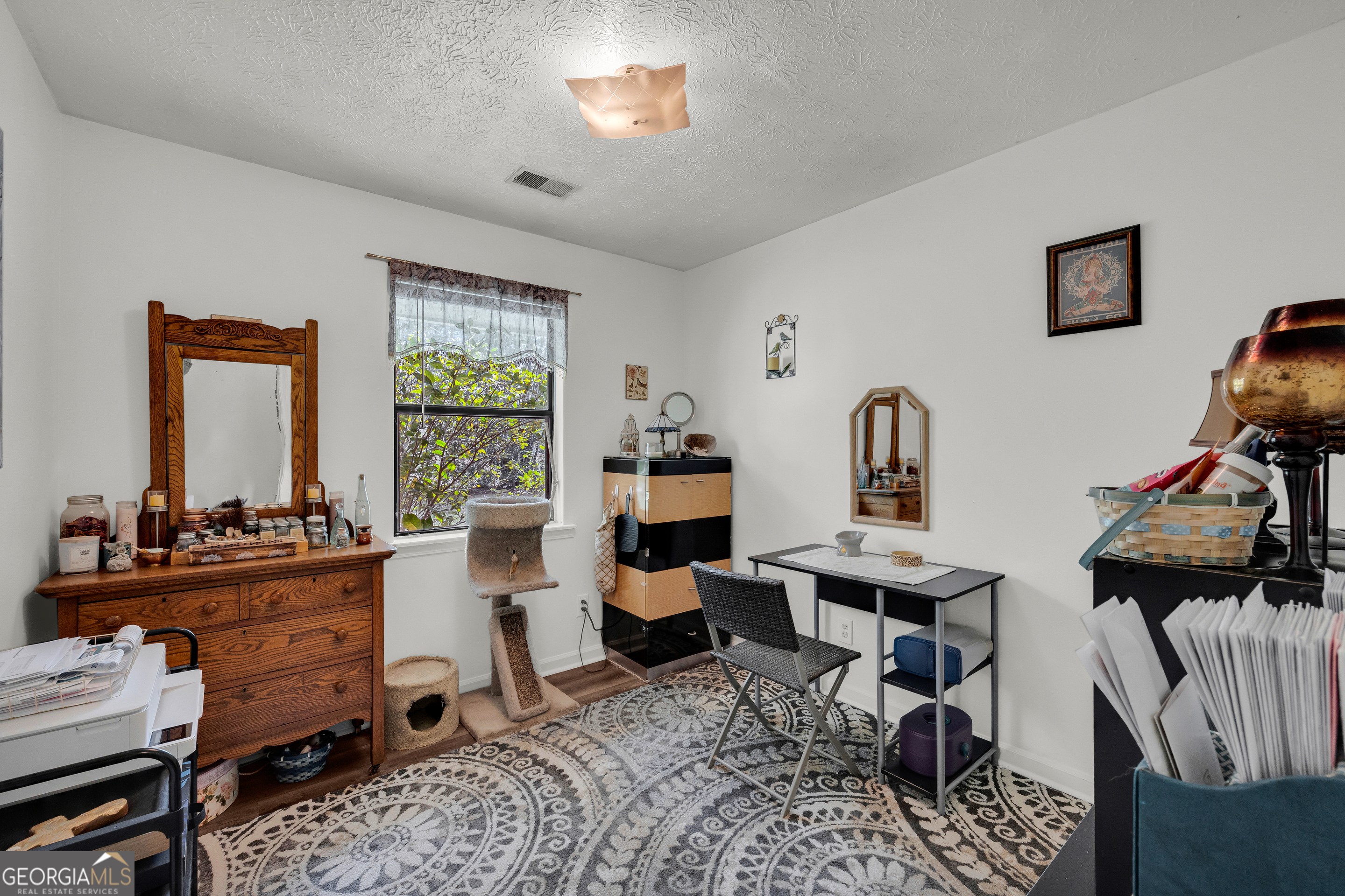 342 Brown Bridge Road Auburn, GA 30011 - Photo 71 of 74 a living room with furniture and a window
