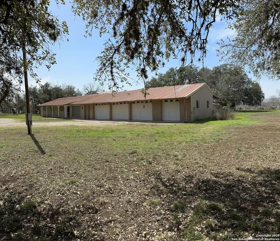 a front view of a building with outdoor area