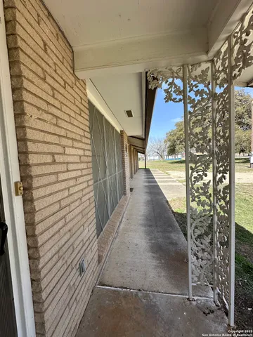 a view of parking garage with cars