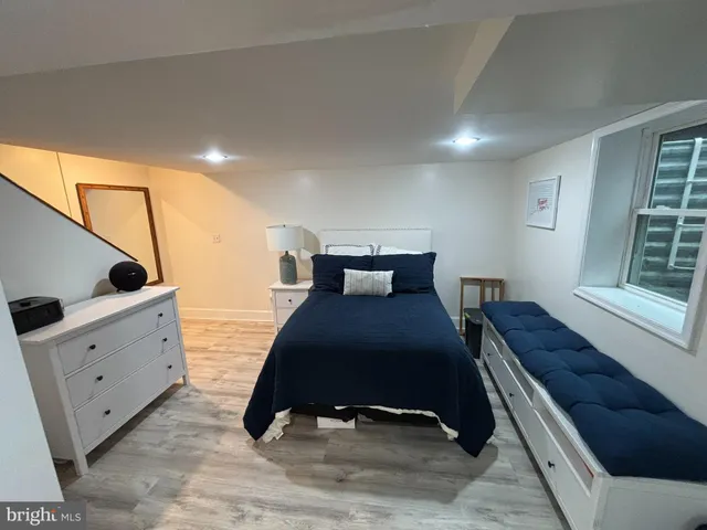 a bathroom with a toilet and a sink