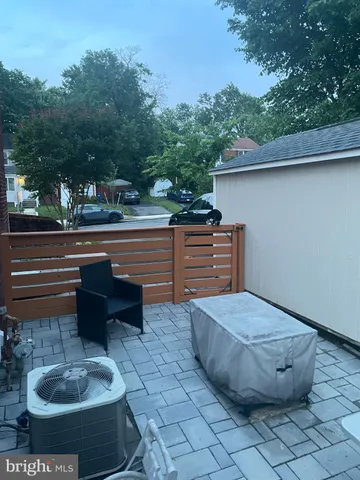 a view of a terrace with chairs
