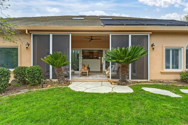 a house view with a garden space