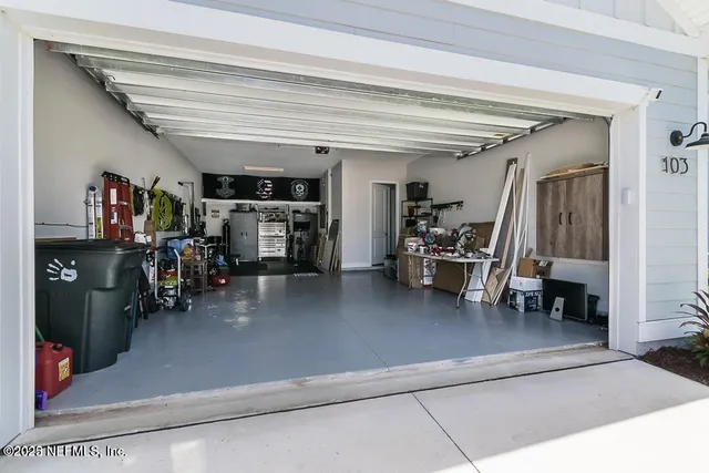 a kitchen with a stove and a refrigerator
