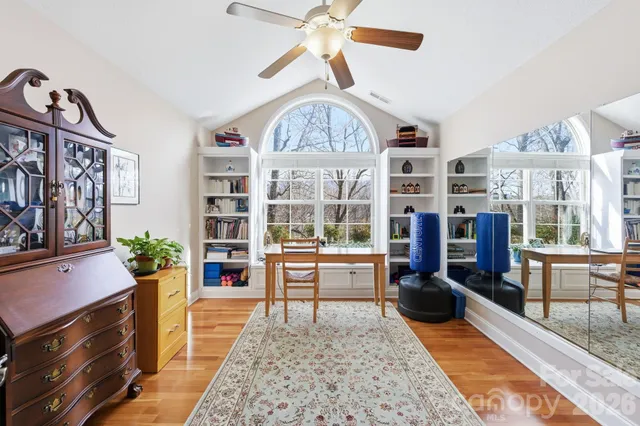 a kitchen with stainless steel appliances granite countertop a refrigerator sink and stove