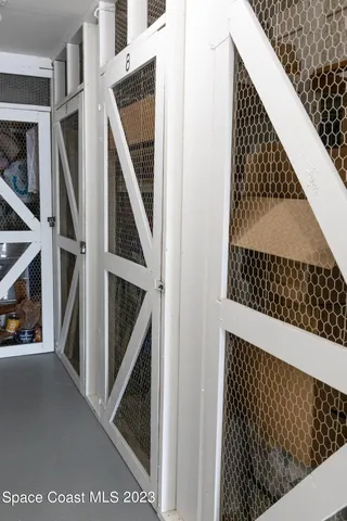 a bathroom with a white bath tub a toilet and a sink