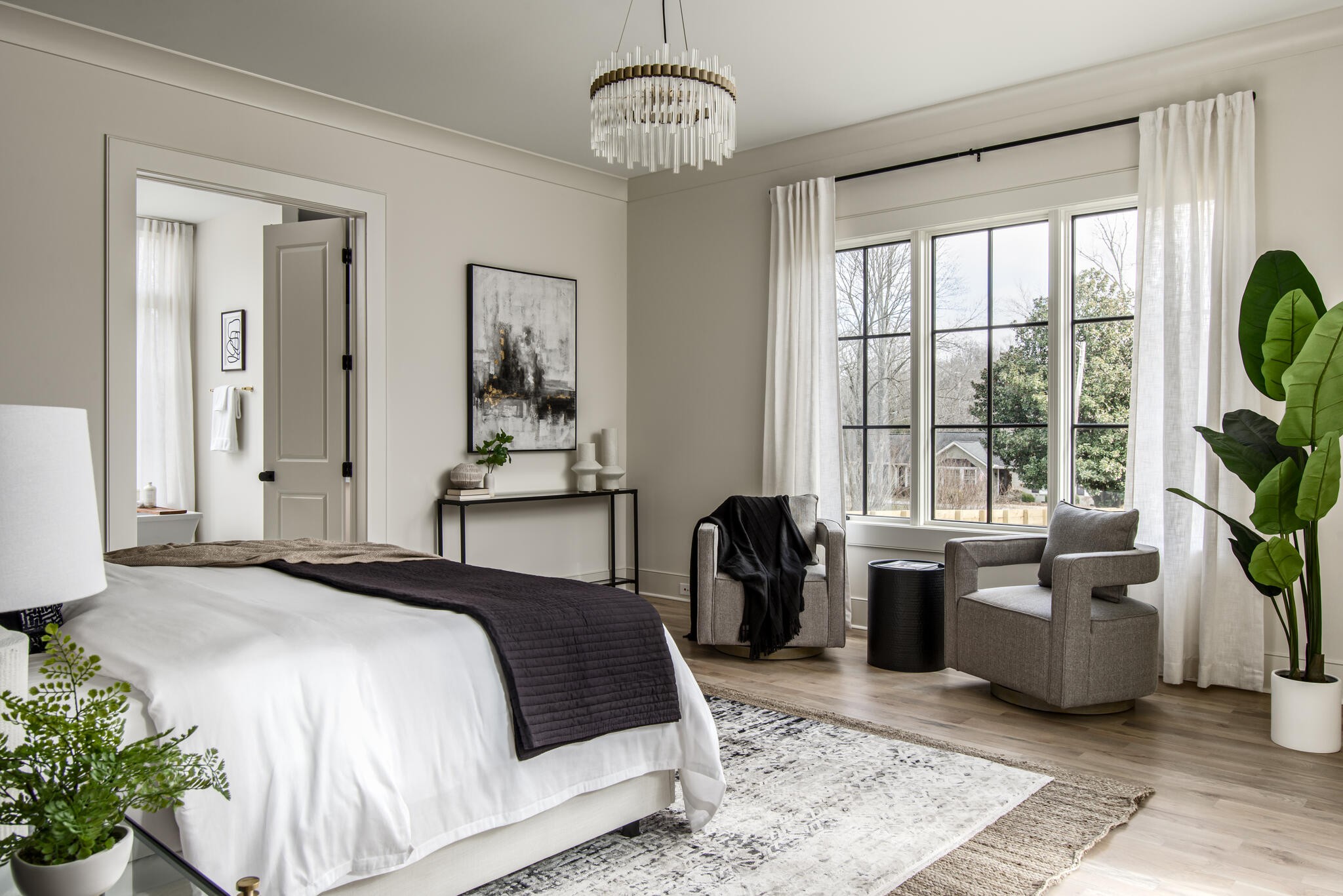 201 Olive Branch Road Nashville, TN 37205 - Photo 37 of 67 a bedroom with a bed and a chandelier