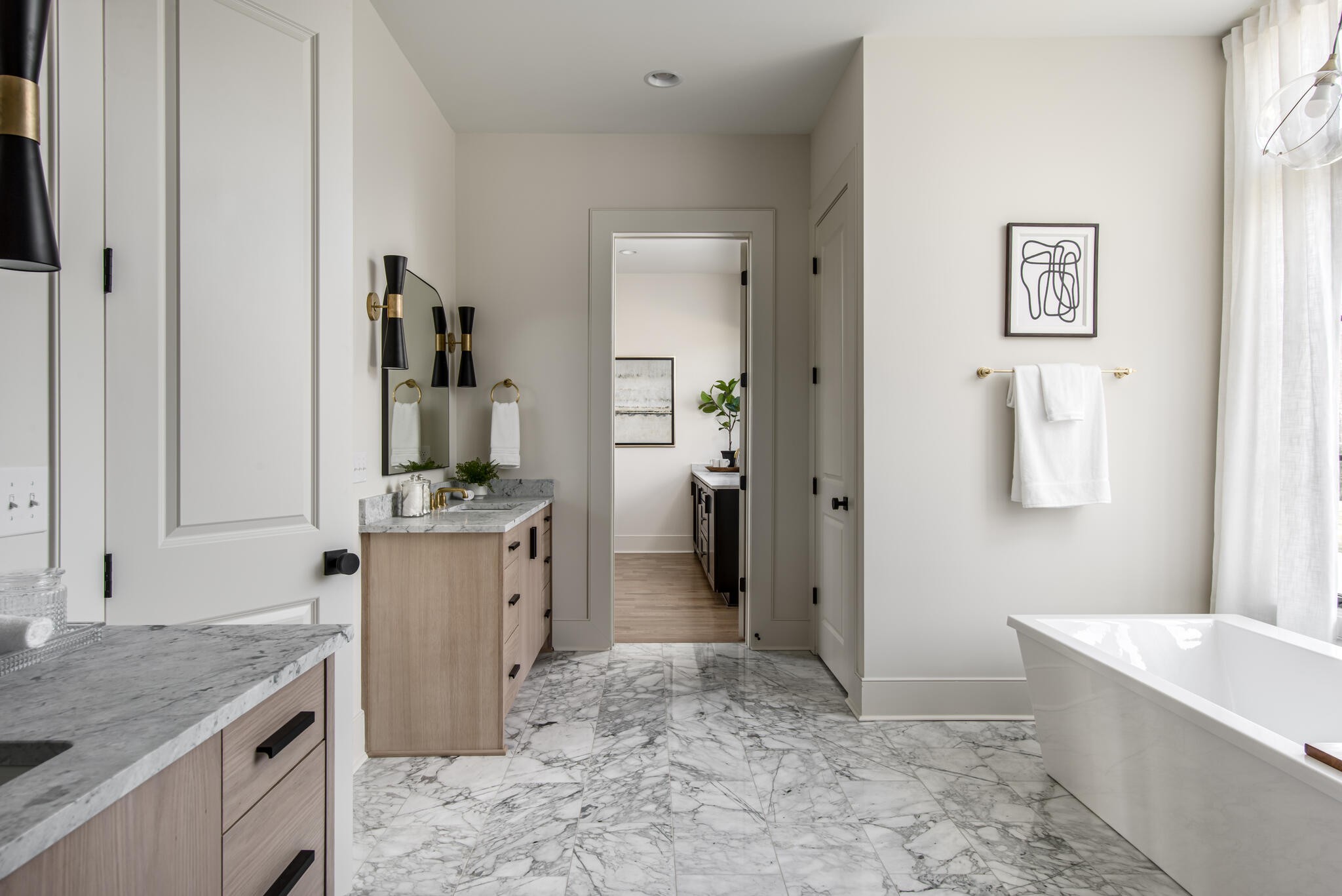 201 Olive Branch Road Nashville, TN 37205 - Photo 44 of 67 a bathroom with a granite countertop sink a mirror and a bathtub