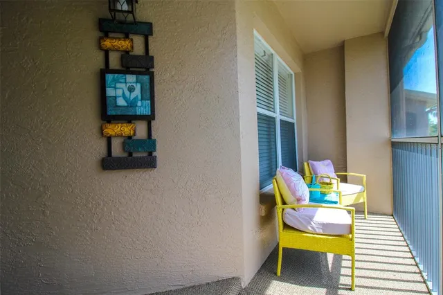 a living room with a table and a window