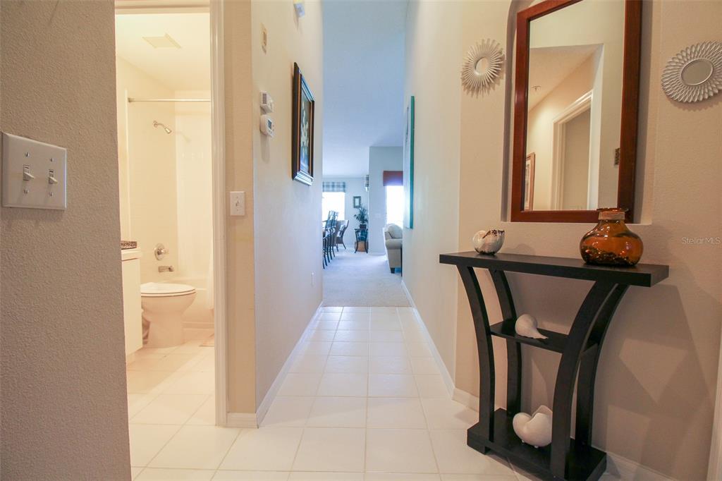 5301 Mahogany Run Avenue, Unit 1023 Sarasota, FL 34241 - Photo 17 of 56 a view of a hallway with seating area