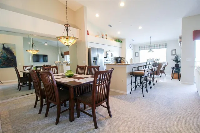 a kitchen with stainless steel appliances granite countertop a sink stove and microwave