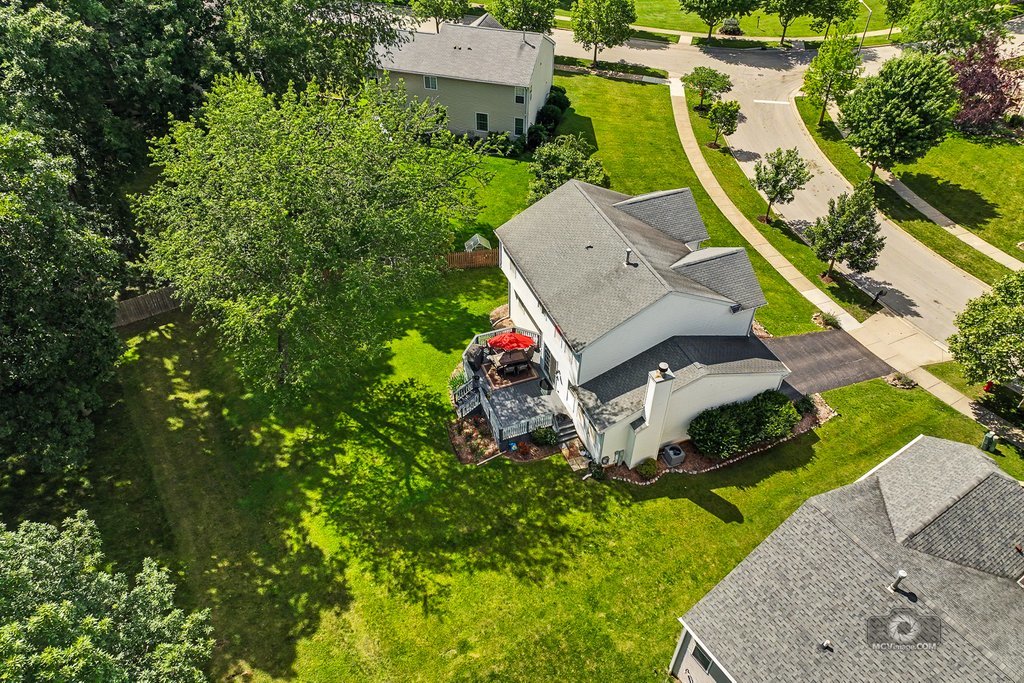 483 Elm Ridge Road Carpentersville, IL 60110 - Photo 29 of 31 an aerial view of residential house with outdoor space and trees