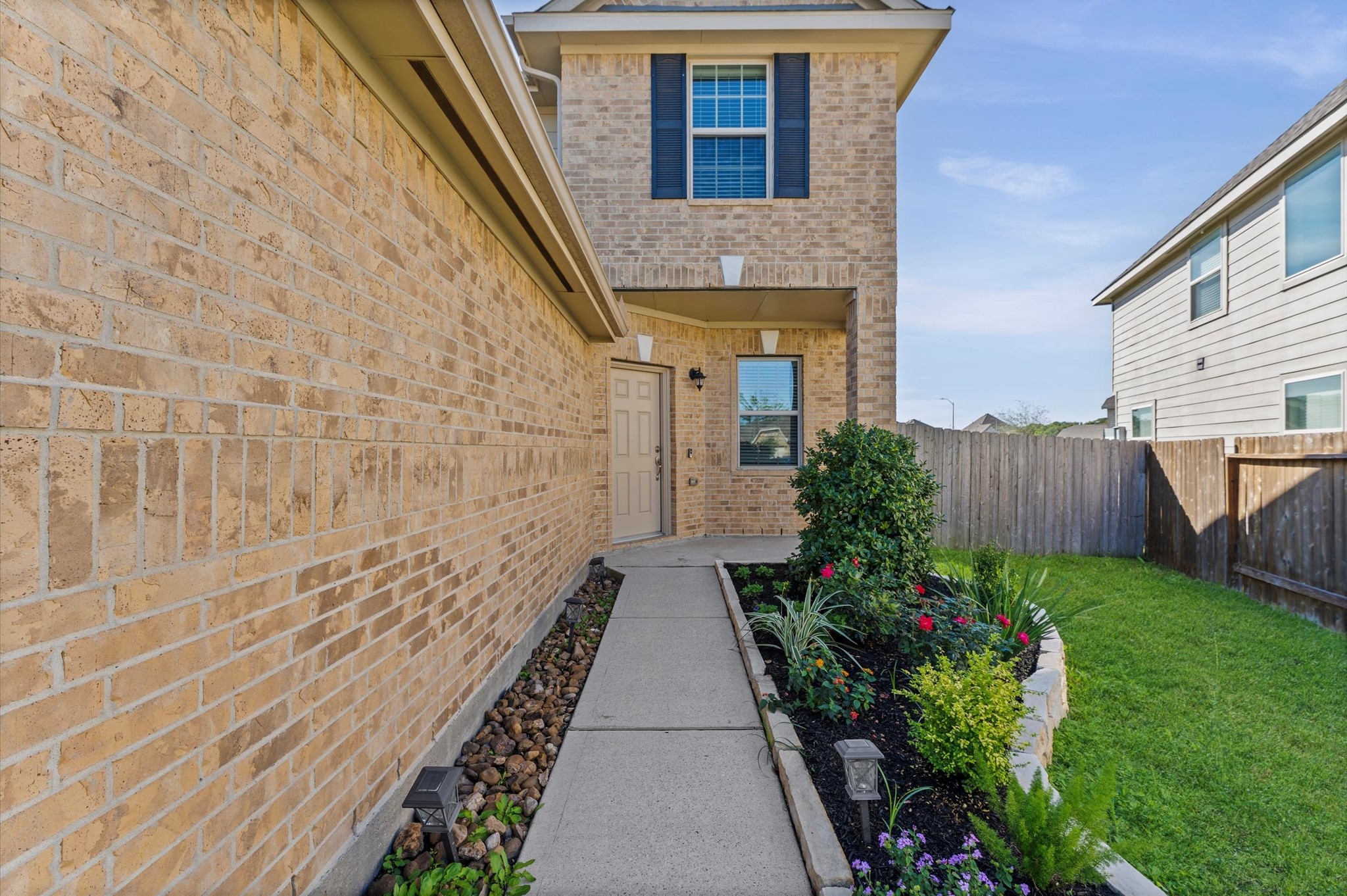 15207 Lake Erie Drive Humble, TX 77396 - Photo 2 of 37 a view of a pathway both side of a house