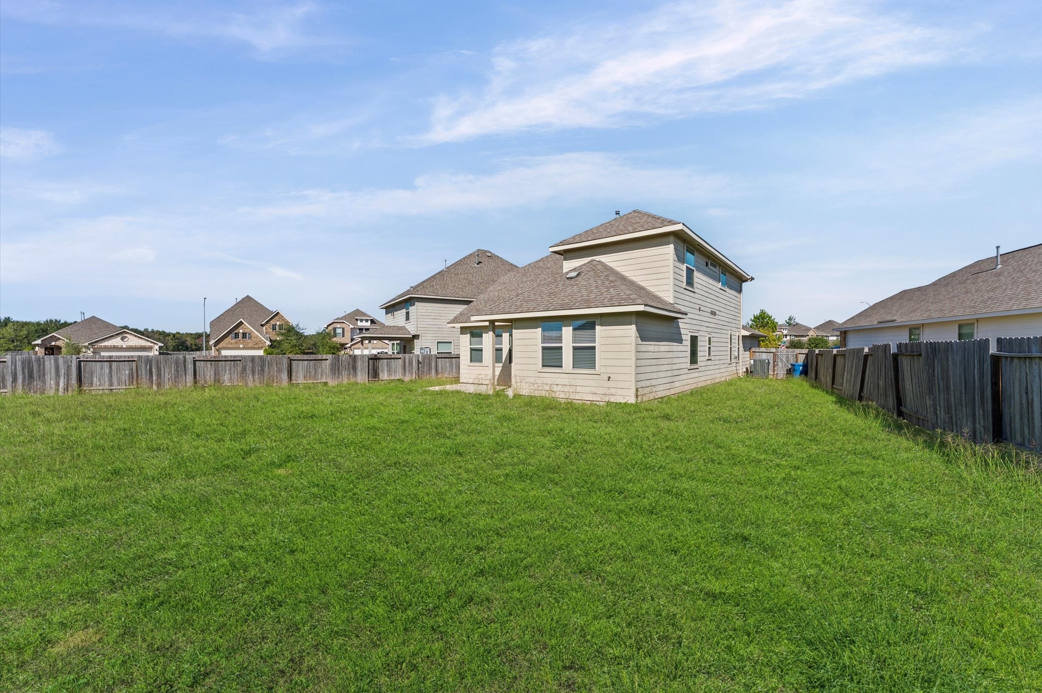 15207 Lake Erie Drive Humble, TX 77396 - Photo 29 of 37 a view of a big yard with plants and large trees
