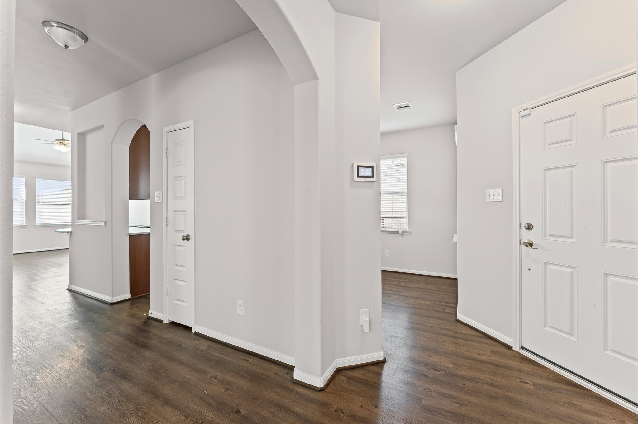 15207 Lake Erie Drive Humble, TX 77396 - Photo 4 of 37 a view of a hallway with wooden floor