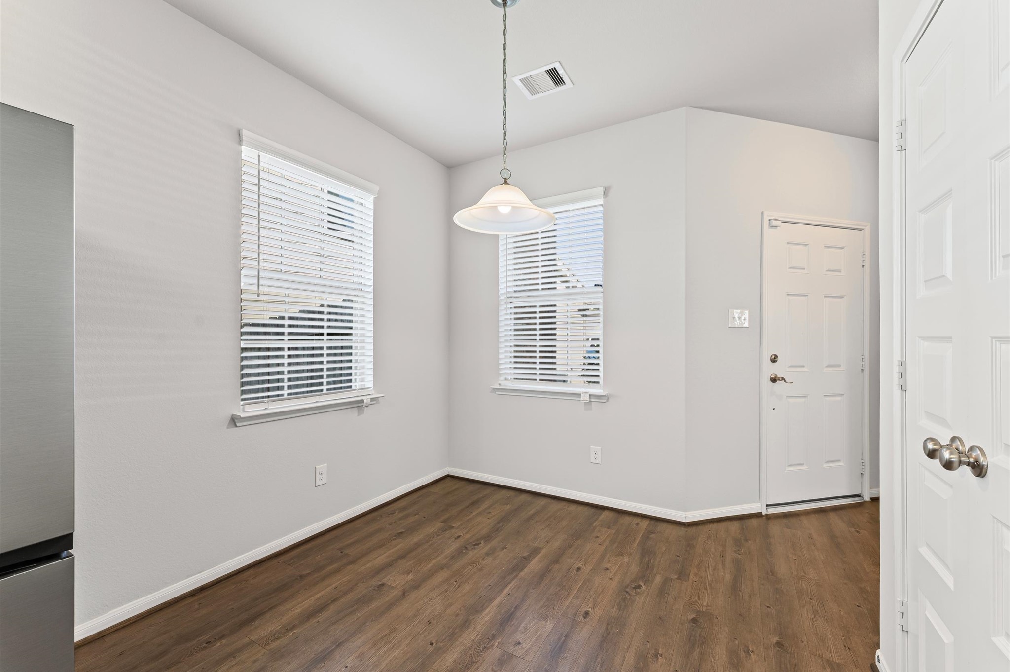 15207 Lake Erie Drive Humble, TX 77396 - Photo 9 of 37 a view of a room with wooden floor and windows