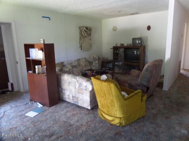 2095 Nottingham Road Melbourne, FL 32935 - Photo 2 of 13 Living Room
