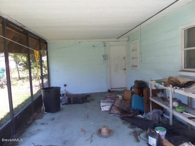 2095 Nottingham Road Melbourne, FL 32935 - Photo 11 of 13 Screened Porch