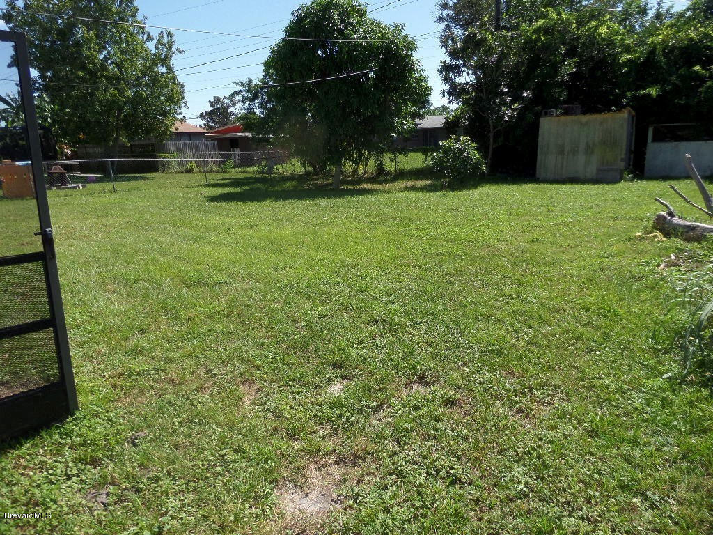 2095 Nottingham Road Melbourne, FL 32935 - Photo 12 of 13 Backyard from Home