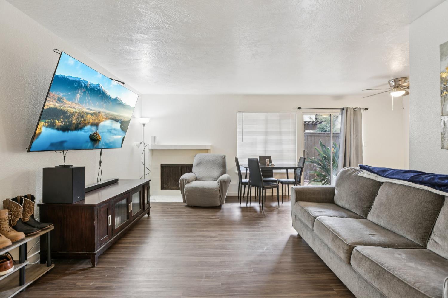 3700 Tully Road, Unit 57 Modesto, CA 95356 - Photo 5 of 34 a living room with furniture and a flat screen tv