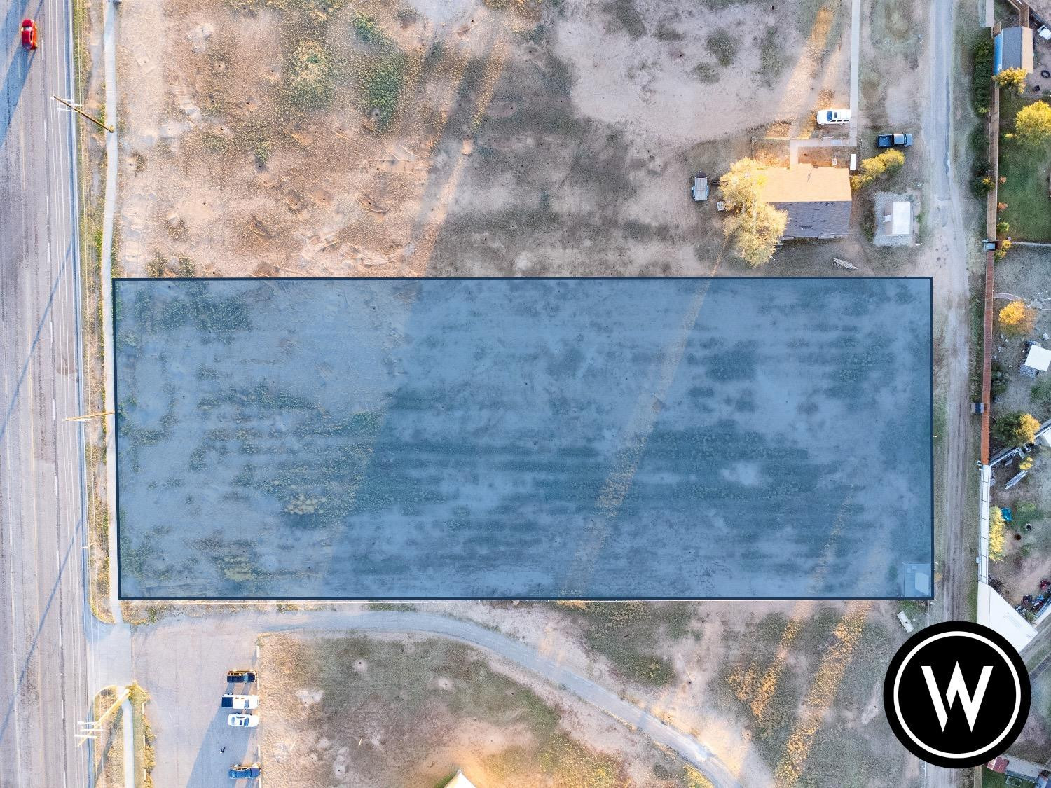 6000 4th Street Lubbock, TX 79416 - Photo 3 of 22 view of a bathroom with a sink and a window