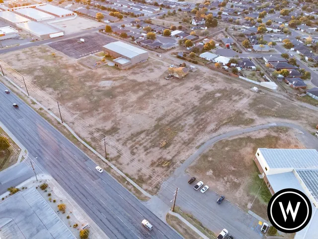 an aerial view of residential house with outdoor space