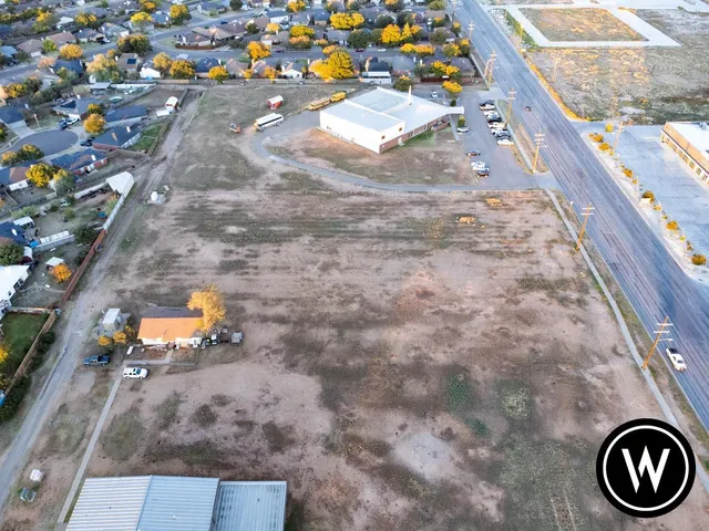 an aerial view of residential house with outdoor space