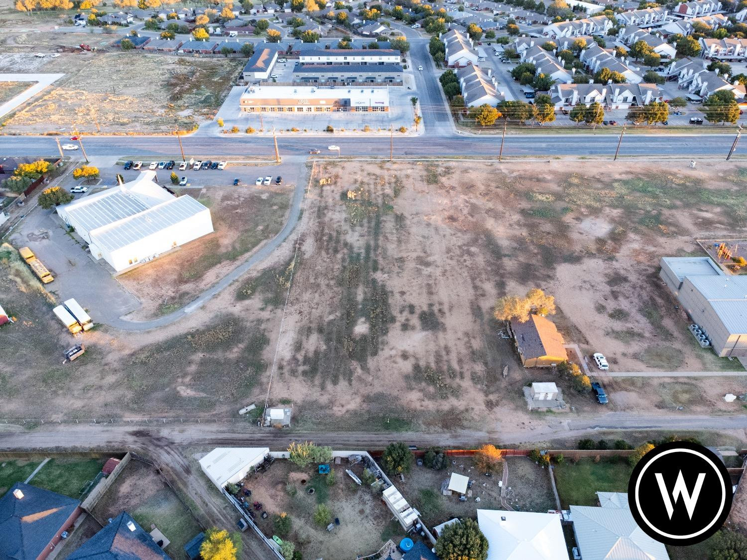 6000 4th Street Lubbock, TX 79416 - Photo 10 of 22 an aerial view of residential house with outdoor space