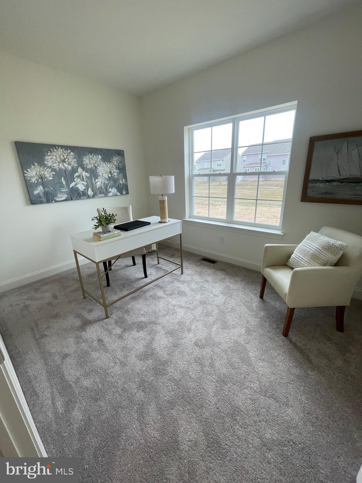 642 Gordon House Way Middletown, DE 19709 - Photo 15 of 25 a living room with furniture and a window