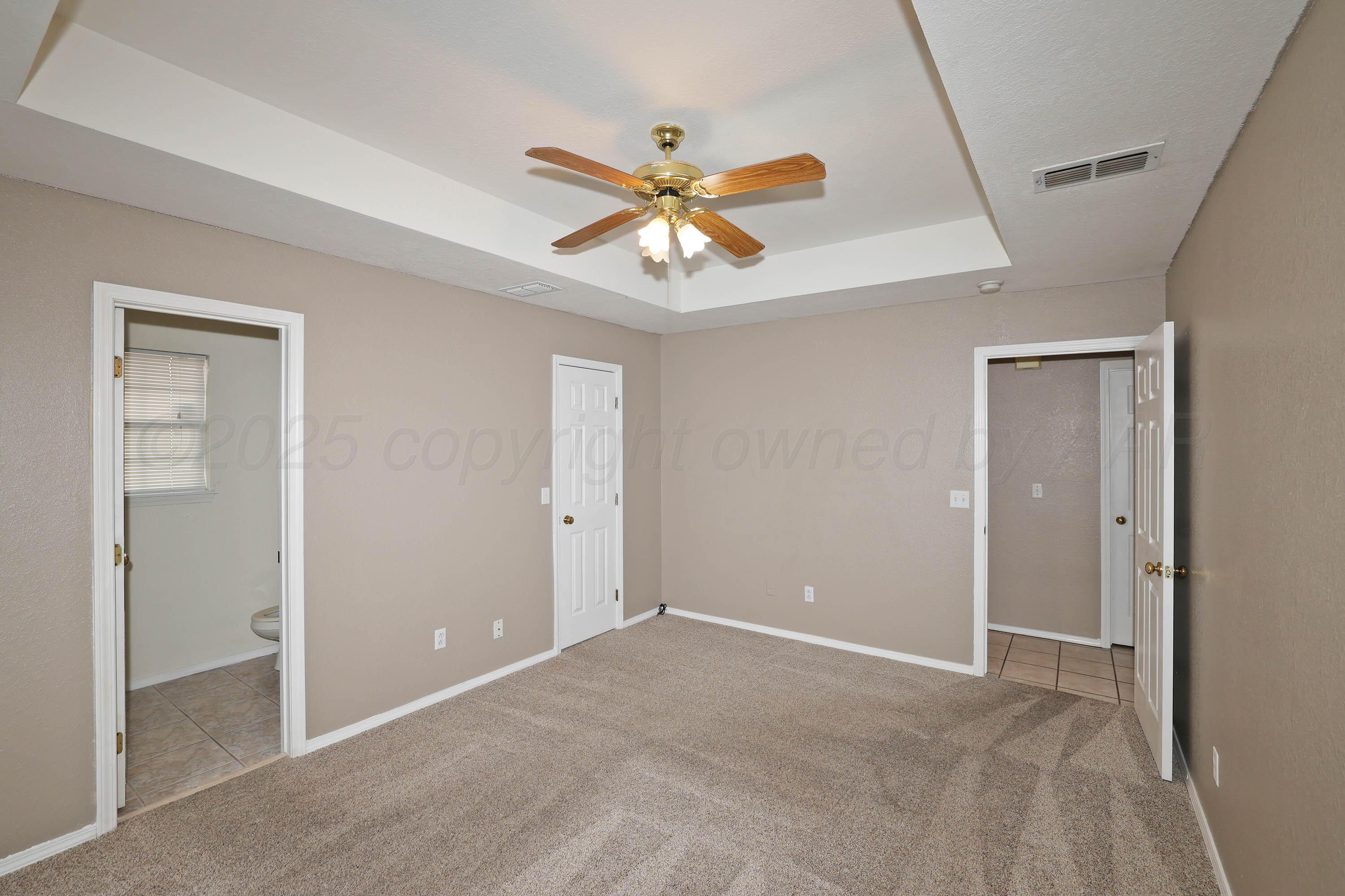5706 Laguna Drive Amarillo, TX 79110 - Photo 14 of 27 13-Primary Bedroom