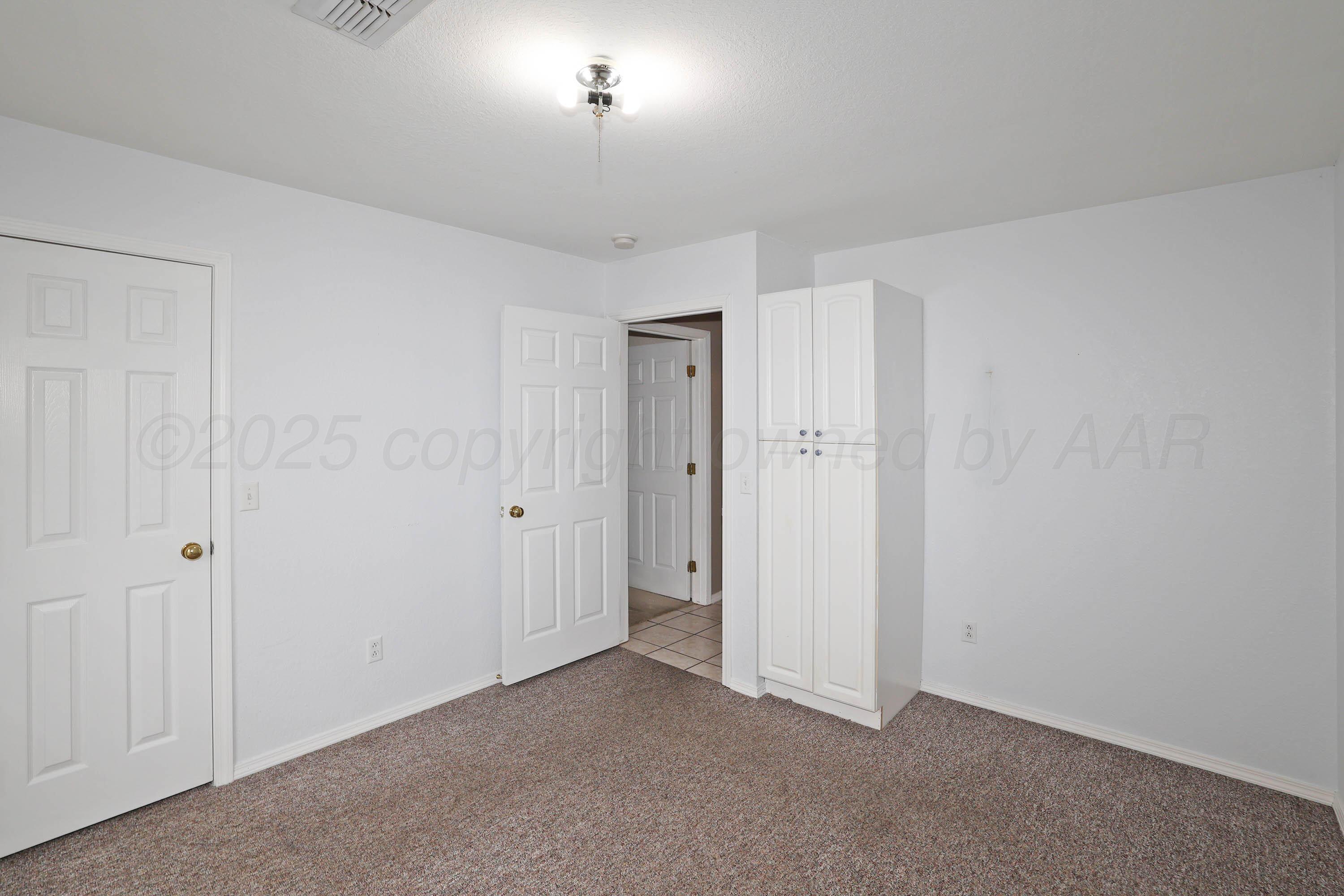 5706 Laguna Drive Amarillo, TX 79110 - Photo 22 of 27 21-3rd Bedroom