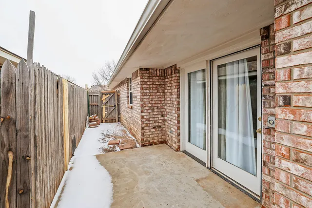 a view of a pathway with a backyard