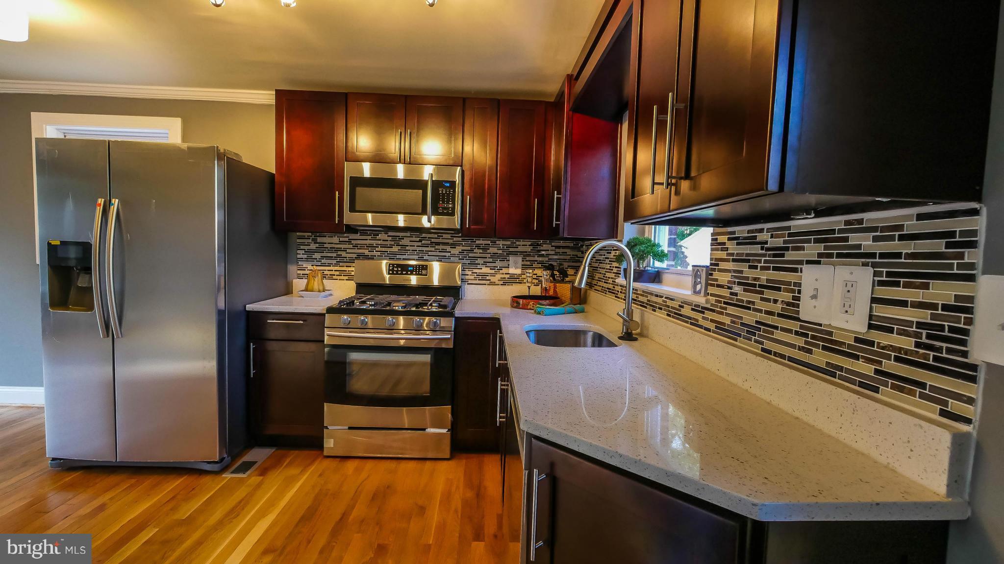 3705 Brightview Street Silver Spring, MD 20902 - Photo 5 of 19 Granite Counter & Stainless Steel Appliances