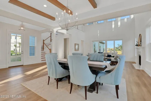 a bathroom with a shower and a glass door