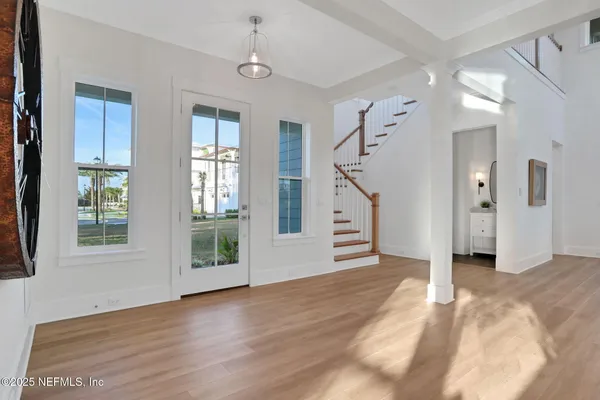a room with a sink and cabinets