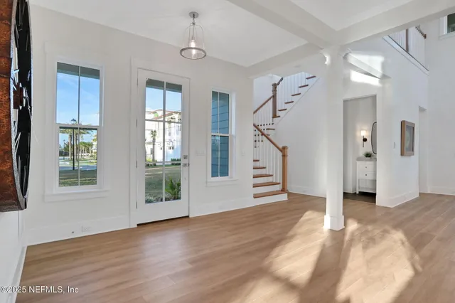a room with a sink and cabinets