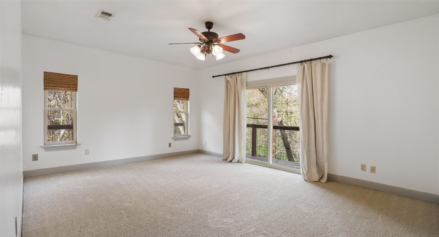 13918 Hummingbird Lane Austin, TX 78732 - Photo 18 of 36 a view of an empty room with a window