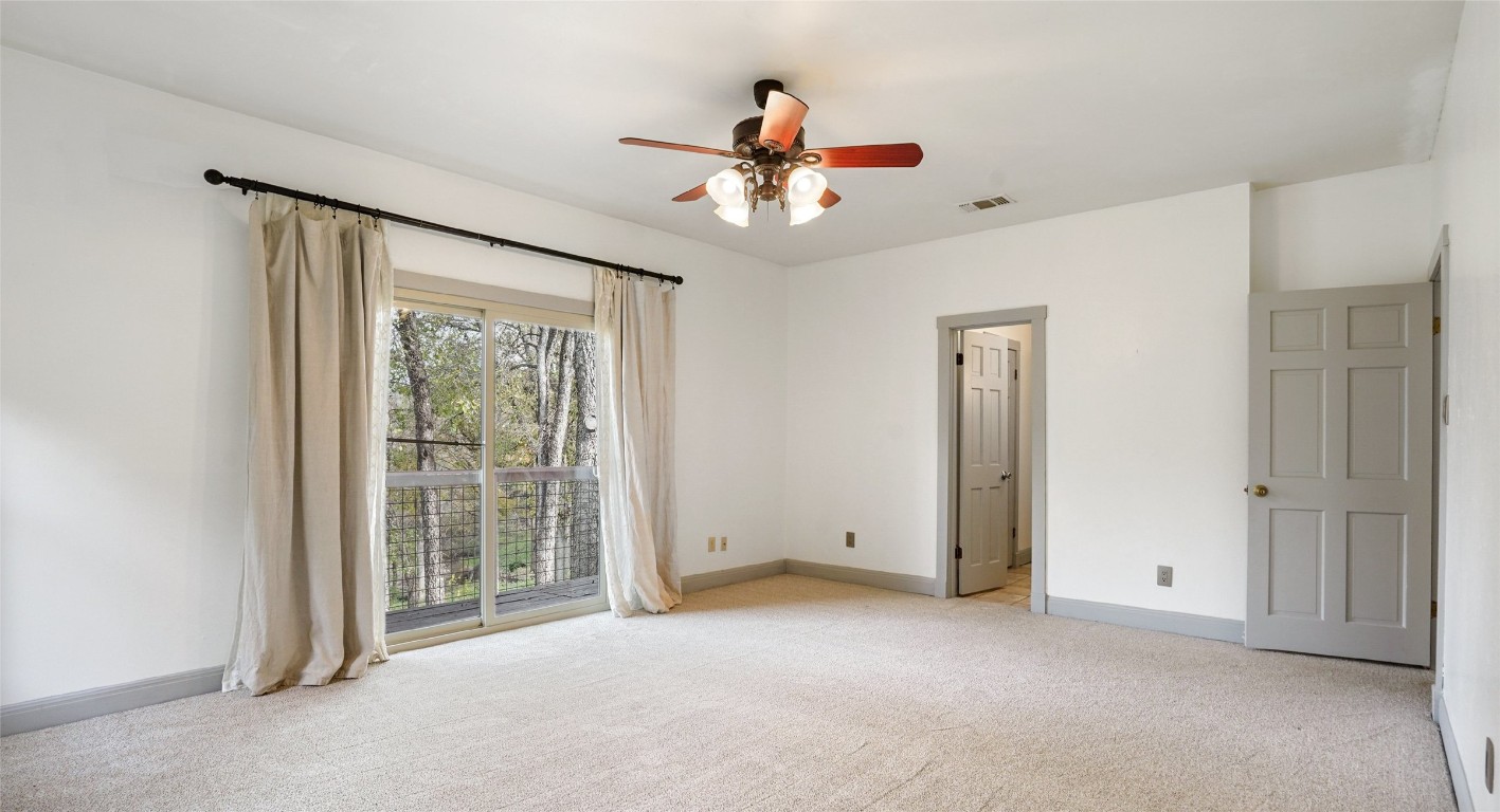 13918 Hummingbird Lane Austin, TX 78732 - Photo 19 of 36 a view of an empty room with a window