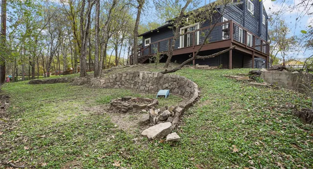 a backyard of a house with lots of green space
