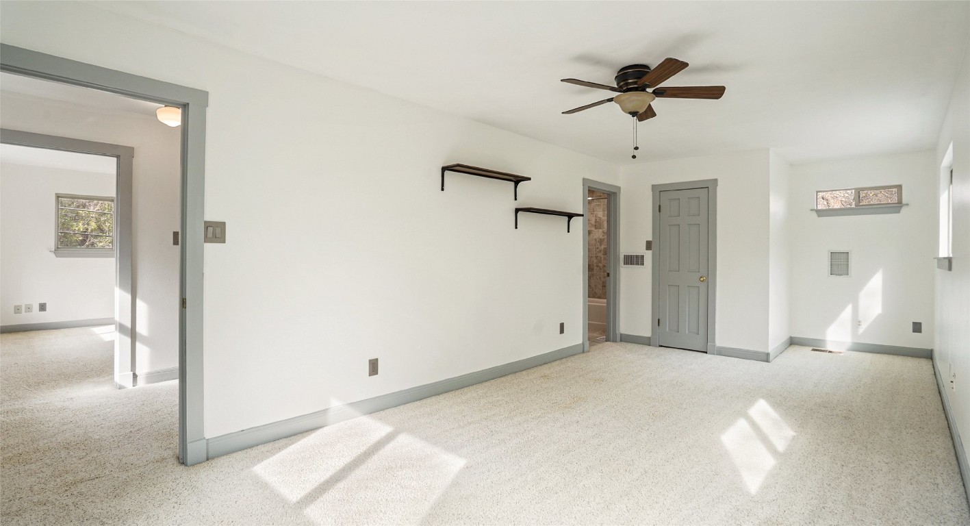 13918 Hummingbird Lane Austin, TX 78732 - Photo 33 of 36 a view of a livingroom with a ceiling fan