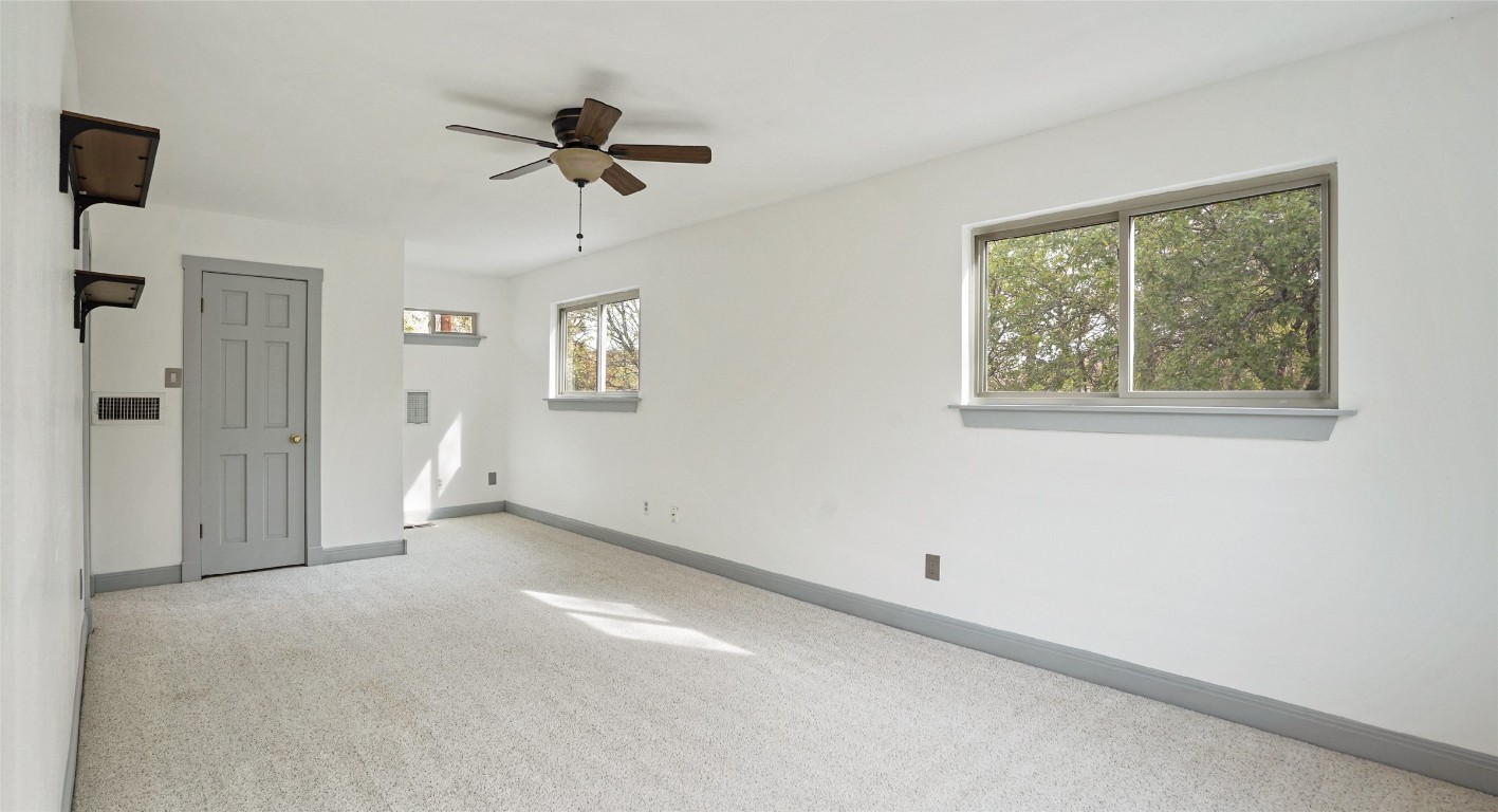 13918 Hummingbird Lane Austin, TX 78732 - Photo 34 of 36 a view of an empty room with a window