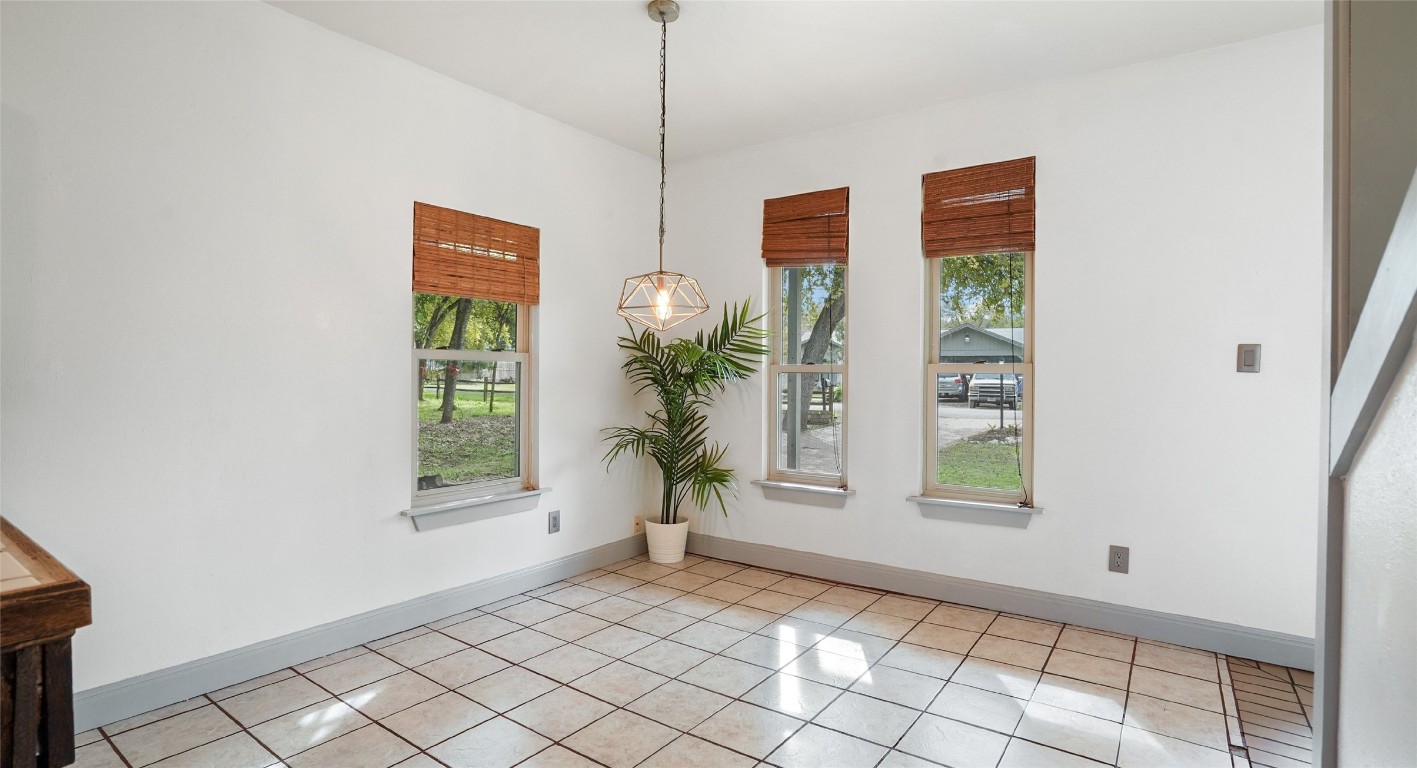 13918 Hummingbird Lane Austin, TX 78732 - Photo 10 of 36 a view of an empty room with windows